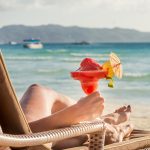 young beautiful woman enjoying summer vacation, beach relax, sun
