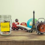 money jar with travel destinations representing affordable travel